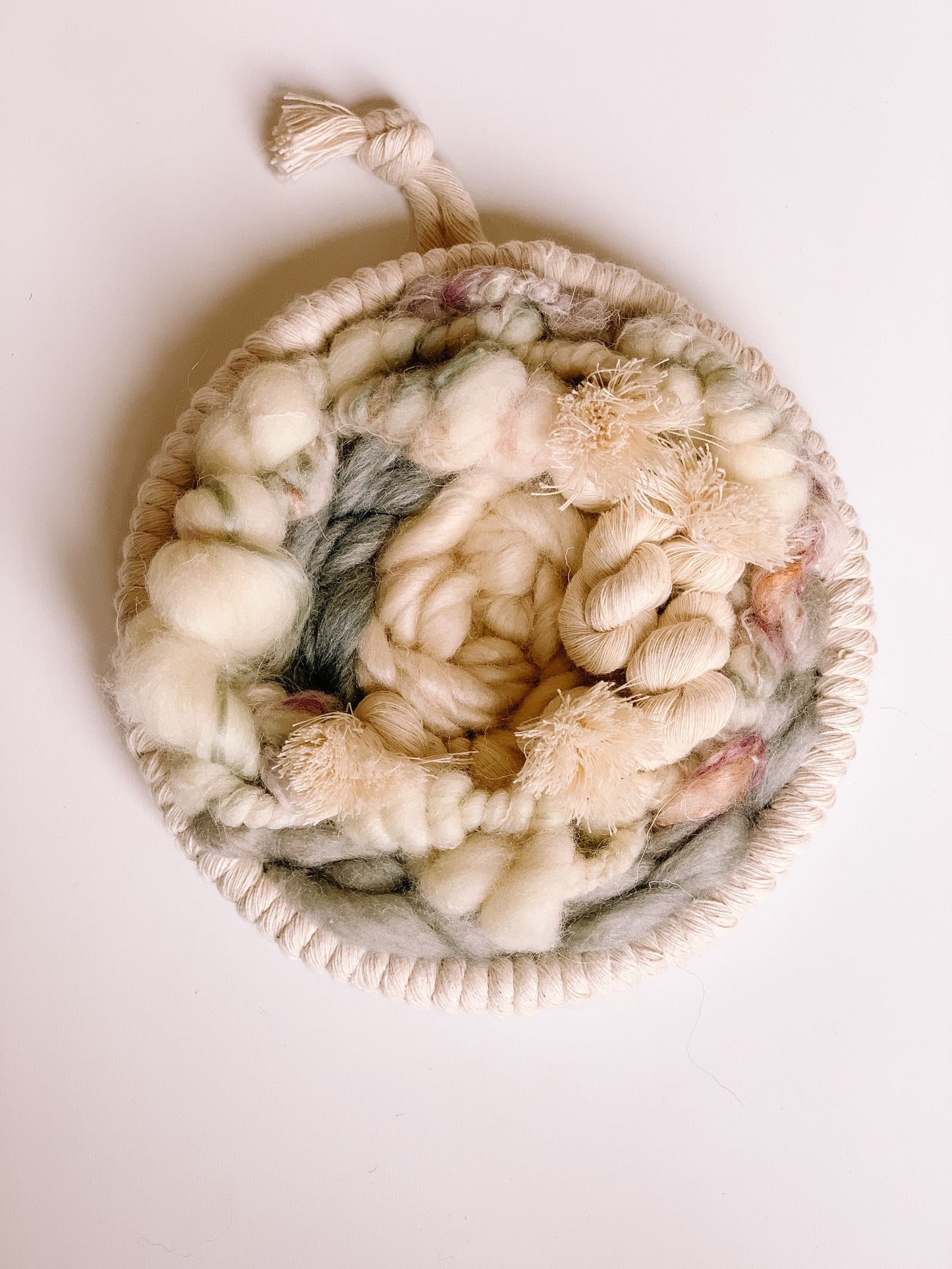 Woven round wall hanging