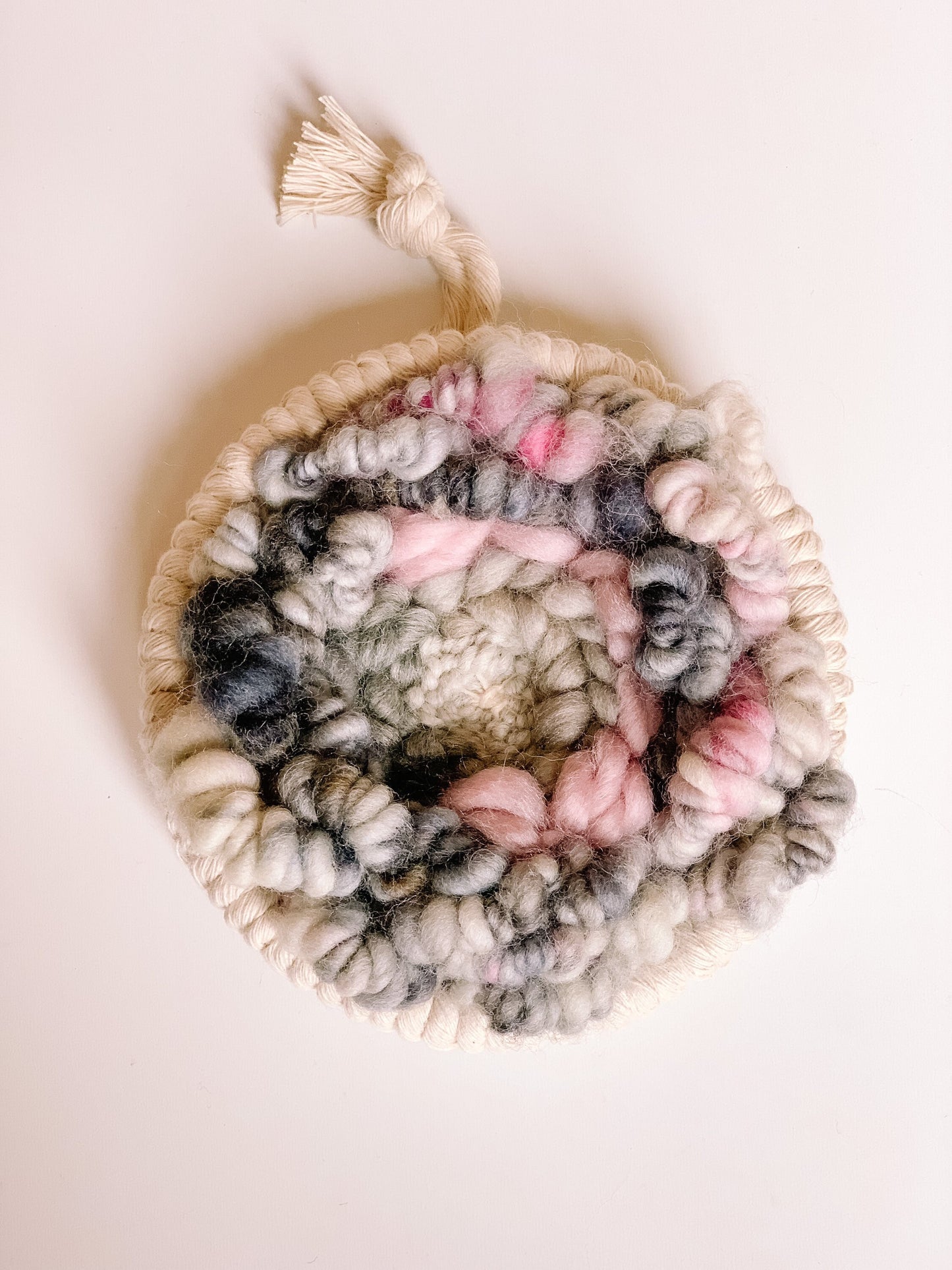 Woven round wall hanging