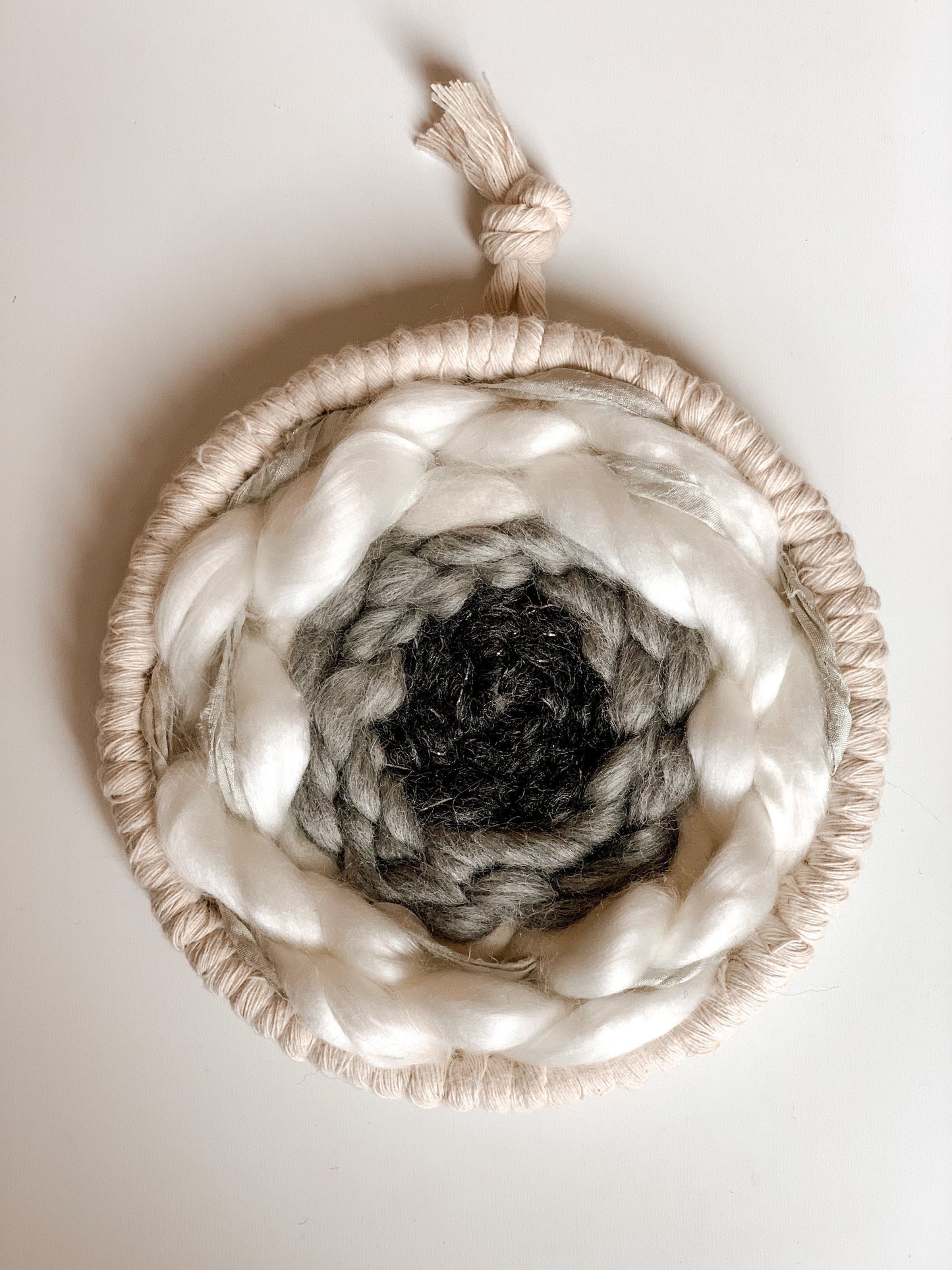 Woven round wall hanging